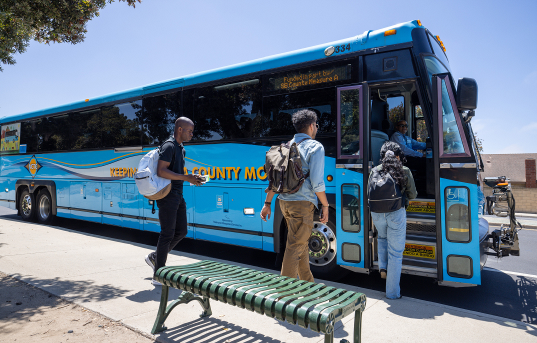 Commuter riders board a Ventura County Transportation Commission bus.